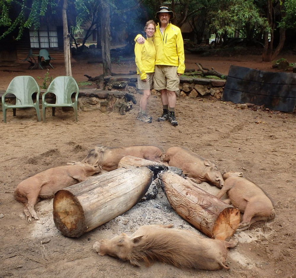 Dennis and Terry Struck pose behind a real Warthog Sounder (group).